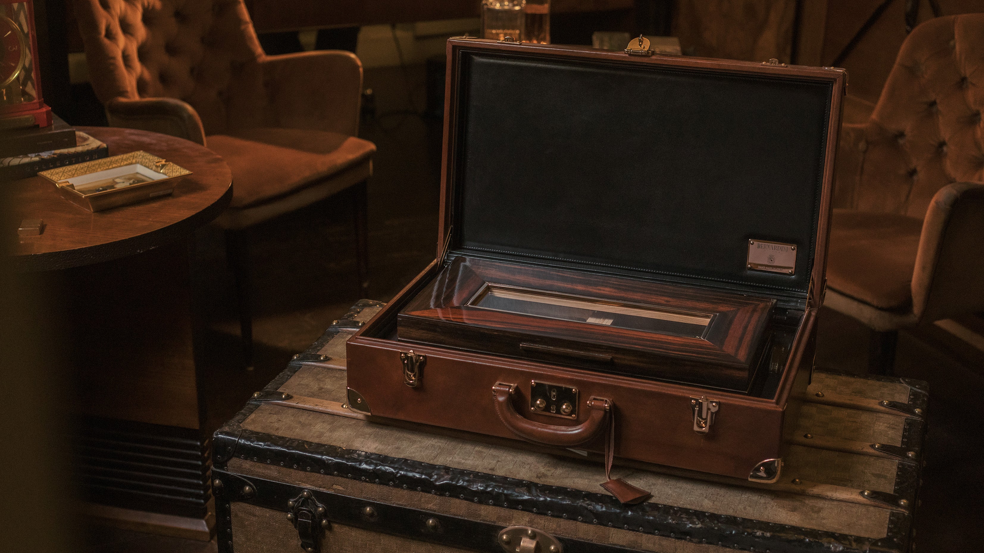 Bernardini Milano Humidor on top of a vintage trunk