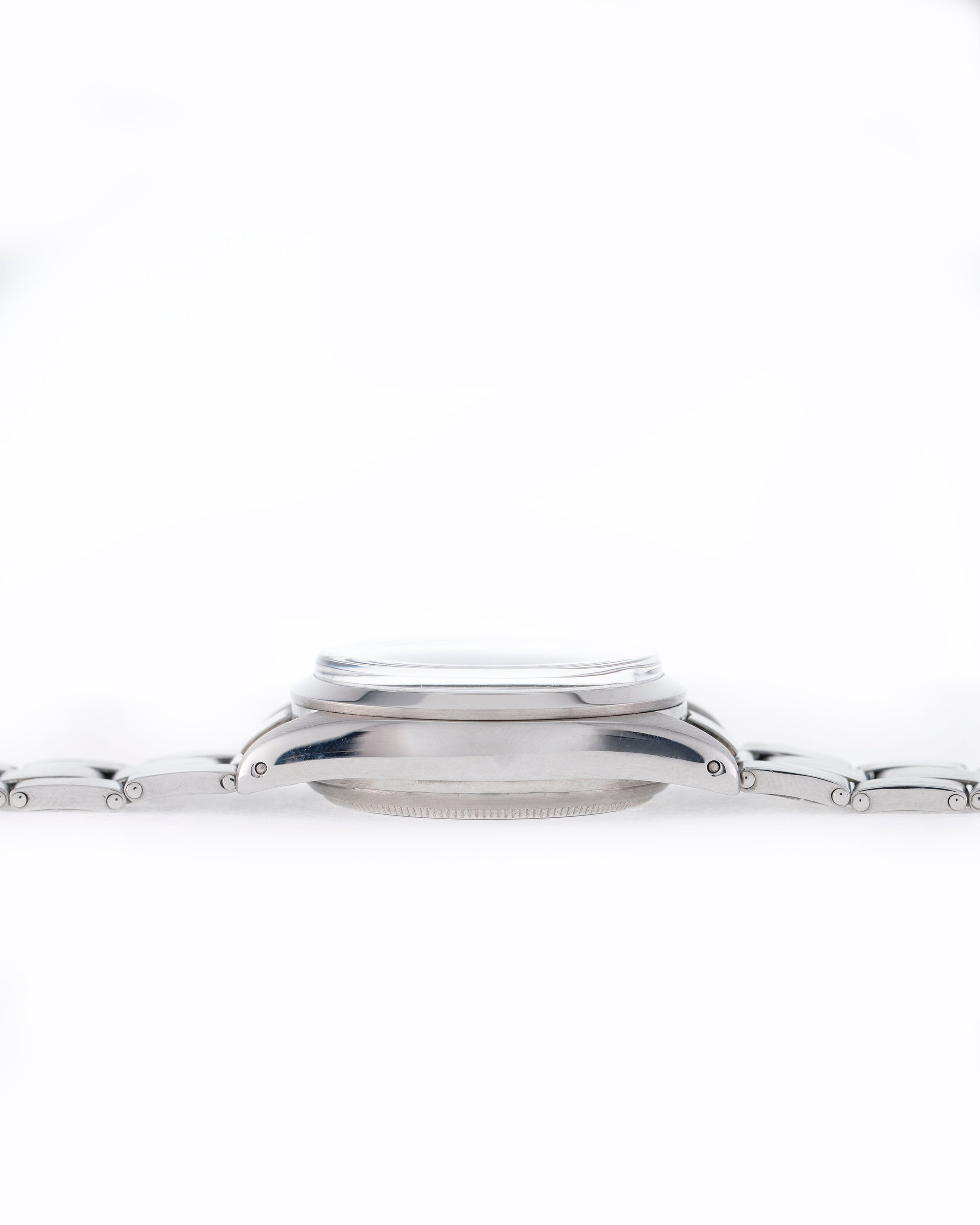 Ref. 6234 Case: water resistant 36 mm in stainless steel, screw back and crown, rounded pushers and flat bezel with Oyster Rolex bracelet.