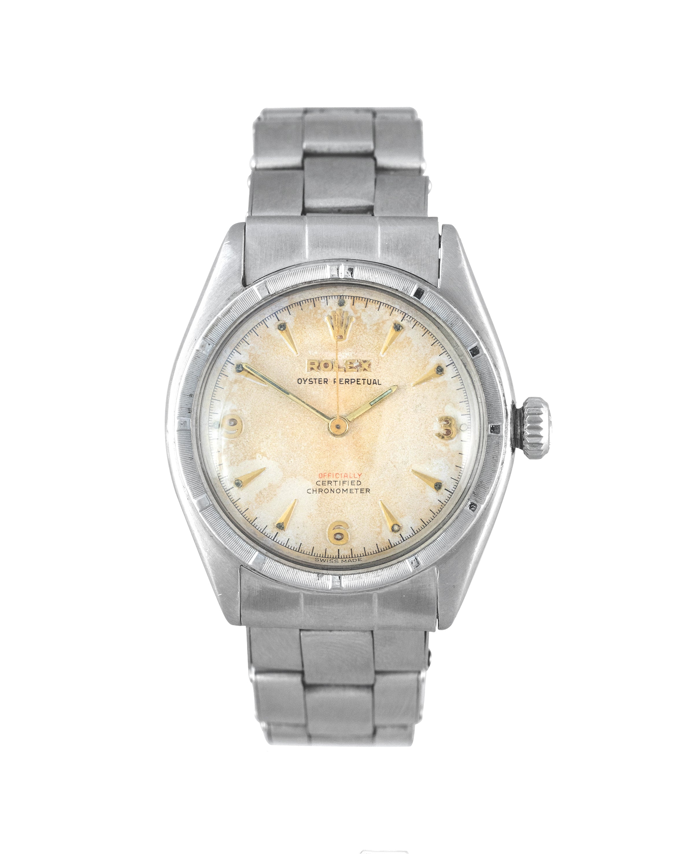 Rolex Ref. 6103 Oyster Perpetual in stainless steel with offically in red and gold indexes front view